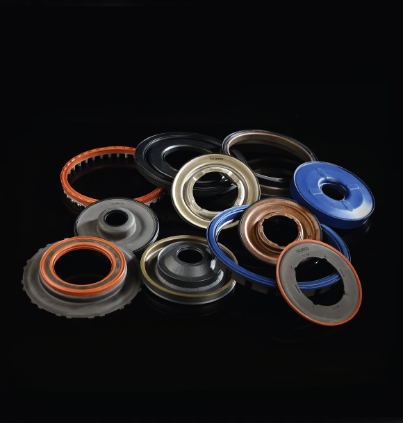 Bonded piston seals